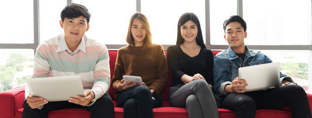 Wall Mural - young business people are looking camera.
