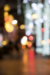 Wall Mural - Blurry background image of defocused colorful lights at night