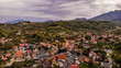© Milan - Aerial view of Bran town near the Bran castle in Transylvania, Romania, Brasov region. Cloudy day with beautiful clouds.