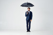© SHOTPRIME STUDIO - business man with an umbrella