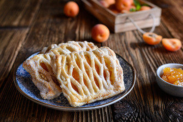 Wall Mural - Puff pastry pies filled with apricot jam and cottage cheese