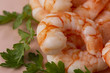 Large boiled shrimps and parsley. Macro. The concept of healthy eating.
