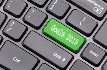 Aufkleber - Goals 2019 on green enter key, of a black keyboard.