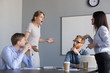 Business women colleagues disputing arguing at corporate office meeting, mad angry shocked female employee disagree with coworker blaming for bad work, conflict and rivalry at workplace concept