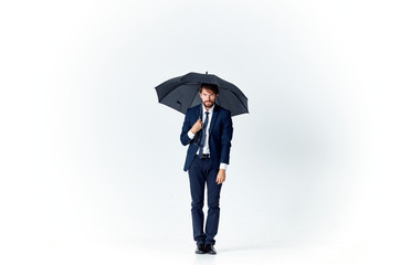 Wall Mural - business man with an umbrella