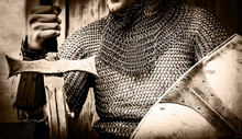 Knight Man Holding Sword And Shield. Image In Black And White Color Style