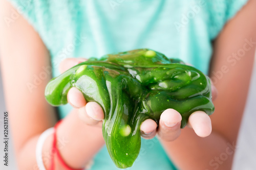 Fotomural Colorful of Homemade Toy Called Slime, Kids having fun and being creative by science experiment