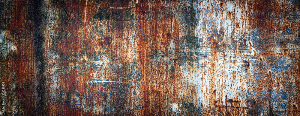 Rusty metal wall, old sheet of iron covered with rust with multi-colored paint - obrazy, fototapety, plakaty 