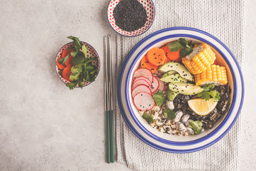 Canvas Print - Vegan poke bowl with brown rice, sea kale and vegetables.