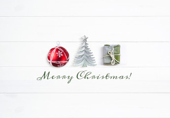 Wall Mural - concept of christmas and new year. greeting card festive composition of red ball, christmas tree and