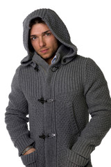 Wall Mural - Good looking young man wearing winter hoodie sweater on shirt