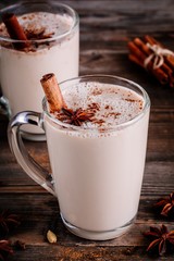 Canvas Print - Homemade Chai Tea Latte with anise and cinnamon stick in glass mugs