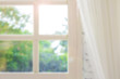 © Lemonsoup14 - Defocused window background with white curtains in morning time.