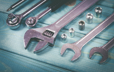 Top view of working tools on wooden background. Construction concept.