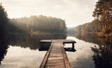Fototapeta  - The Breath Of Autumn. Autumn foliage and fog lake in morning with boat dock