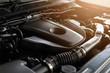 © memorystockphoto - closeup detail of car engine with soft-focus and over light in the background