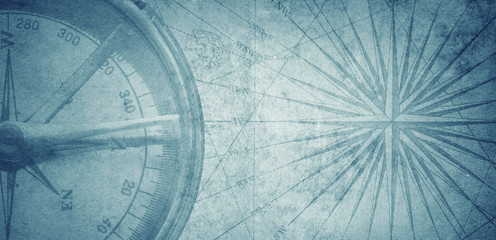 Poster - Ancient vintage blue map and compass  background. Retro style. Science, education, travel, vintage background. History and geography team.