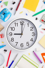 Wall Mural - school accessories and wall clock on white  background