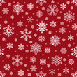 Snowflakes pattern. Christmas falling snowflake on red backdrop. Winter holiday snow seamless vector background