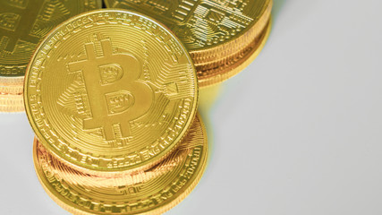 digital currency and financial concept from close up group of gold bitcoin arrange on white isolated background