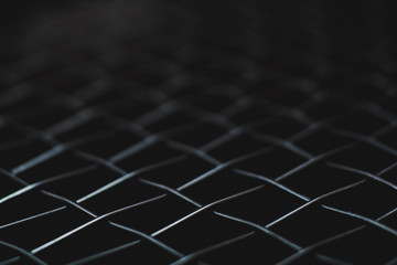 macro shot of black net tennis racket for background