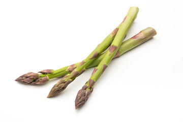 Fresh green asparagus on white background.