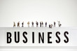 © kirill_makarov - Business word with crowd of miniature business people