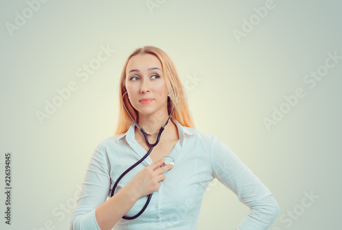Young Woman Listening Heartbeat With Stethoscope Stock Photo Adobe Stock