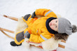 © Maria Sbytova - Little boy enjoying a sleigh ride