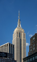 blue sky day in metropolis midtown New York city building skyline