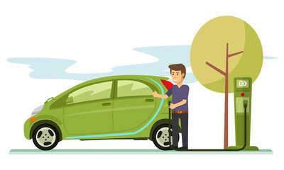  Young Guy charging her electric car in the parking lot
