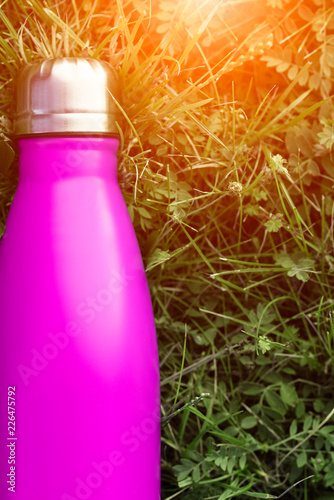 Stainless Thermos Water Bottle Pink Color Mockup Isolated On Green Grass Background With Sunlight Effect Glossy Aluminum Vacuum Thermo Tumbler Flask Stock Photo Adobe Stock