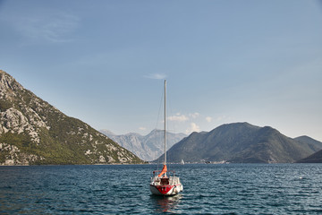 Wall Mural - A lonely yacht in the Bay of Kotor. Montenegro. 