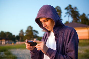 Canvas Print - Young Man with a Phone