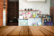 © snowing12 - Selected focus empty brown wooden table and Coffee shop or restaurent blur background with bokeh image. for your photomontage or product display.