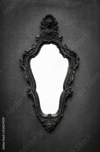 Fotomural antique mirror on a black background