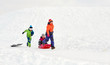 © Syda Productions - childhood, leisure and season concept - group of happy little kids in winter clothes with sled having fun outdoors