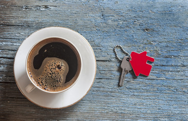 Top view of coffee cup on a wood background with copy space.