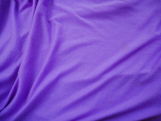 smooth elegant purple silk fabric background.sportswear cloth