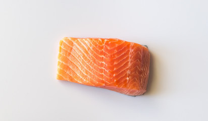 Sticker - Raw salmon on the white background