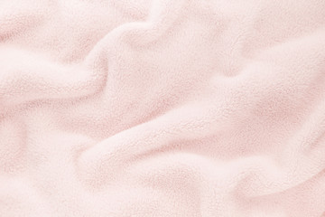 fluffy gentle baby pastel pink rose fabric with waves and folds. soft pastel textile texture. folds 