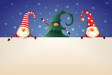 Three Christmas Gnomes With Signboard On Blue Background. One Hidden In Christmas Tree