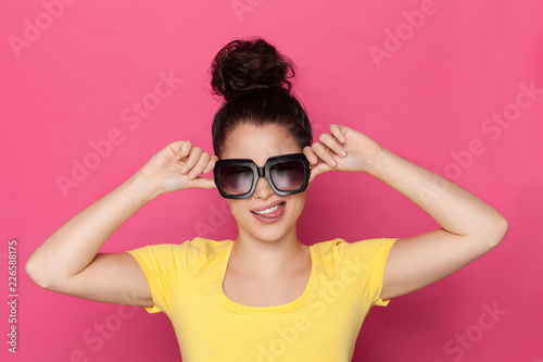 Big Sunglasses In Sticking Out Tongue Large sunglasses Stock Photo Images. 1