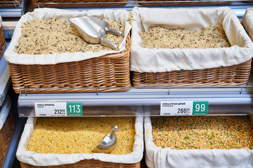 Wall Mural - Variety of healthy grains and seeds in supermarket.