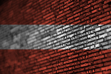 austria flag is depicted on the screen with the program code. the concept of modern technology and s