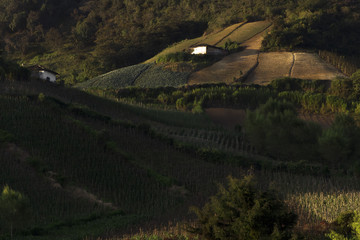 two cabins between the mountains