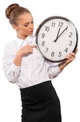 Wall Mural - Portrait of young businesswoman in suit holding big clock