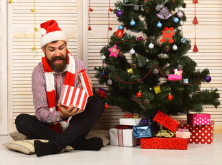 Wall Mural - Santa Claus with excited face red garlands background