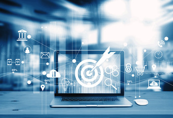 Poster - Digital marketing concept. Blue tone. Modern laptop screen with icon marketing, success and goals target, payments and network connection on business technology background.