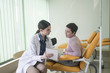 © LStockStudio - A Woman Physician Talking With Her Patient